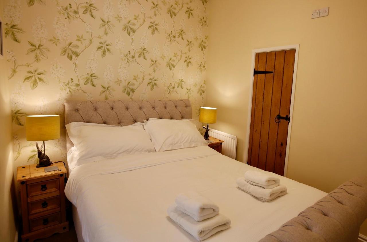 فندق آشفيلد هاوس غراسينغتون الغرفة الصورة A bedroom at the Old Post Office