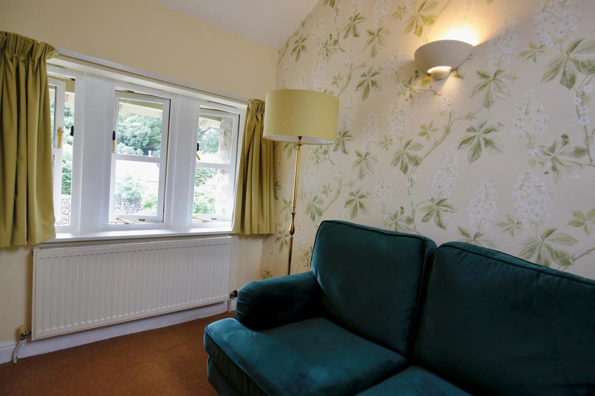 فندق آشفيلد هاوس غراسينغتون الغرفة الصورة A radiator in a living room